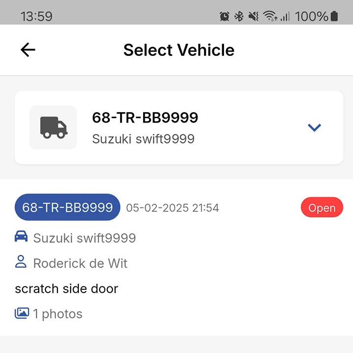 Mobile app screen showing a vehicle selection for a Suzuki Swift with license 68-TR-BB9999, a damage report indicating a scratch on the side door, reporter named Roderick de Wit, and one photo attached. The status is open.